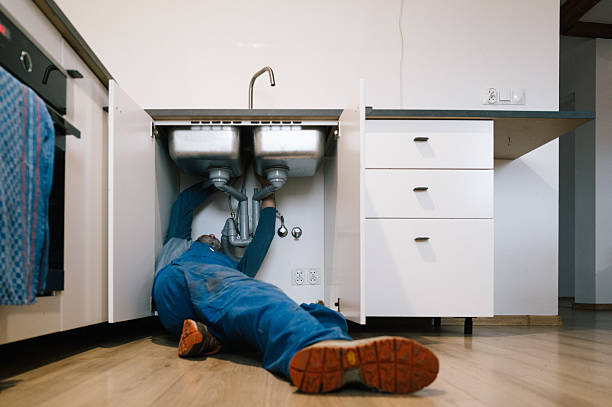 Professional Emergency Plumber technician working in Shelley, ID